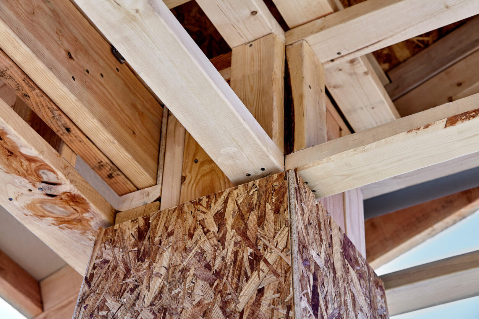 Close-up of timber beams and OSB board