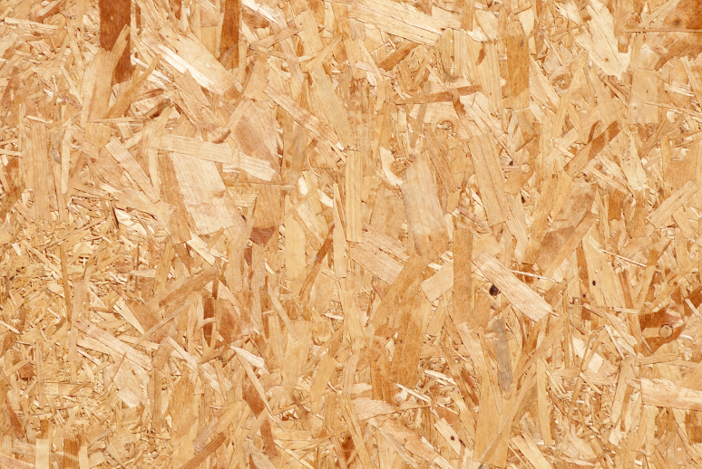 Textured wood panel with visible grain.
