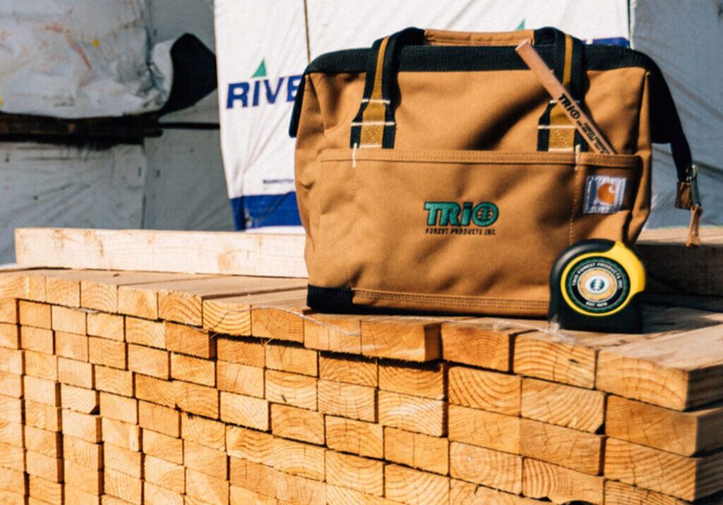 Brown bag and measuring tape on planks