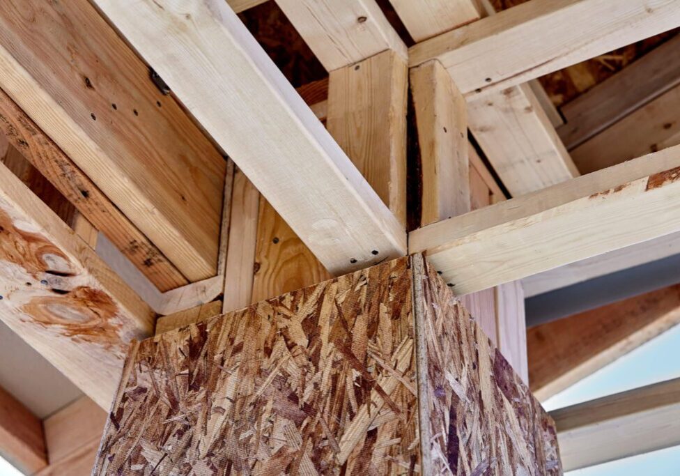 Close-up of timber beams and OSB board